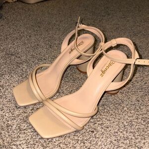 Nude strappy heels